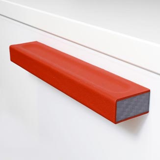 Cabinet pulls made of Carbon and red leather by minimaro