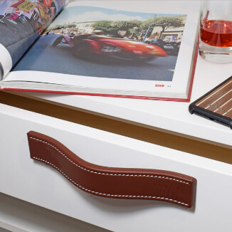 Unique bow handles made of soft nappa leather Unique bow handles made of soft nappa leather