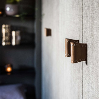 Cabinet hardware in farmhouse style made of leather Cabinet hardware in farmhouse style made of leather