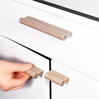 Leather Cabinet Pulls with hand-stitched decorative seams. Leather Cabinet Pulls with hand-stitched decorative seams.