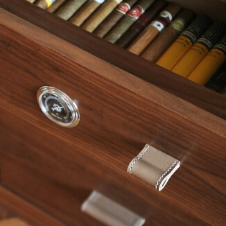 Leather cabinet pulls in color taupe with white stiching Leather cabinet pulls in color taupe with white stiching