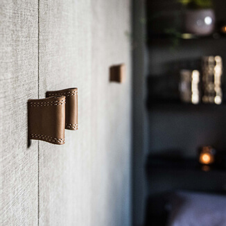 Furniture handles made of finest leather in beige brown Furniture handles made of finest leather in beige brown