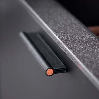 Leather drawer pulls in black with copper rod Leather drawer pulls in black with copper rod