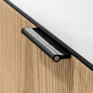 Leather edge pulls in black with brass bar Leather edge pulls in black with brass bar