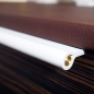 Mobile Preview: Edge pulls made of white leather and brass