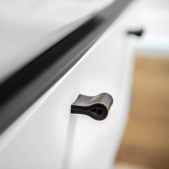 Cabinet handles made of black leather