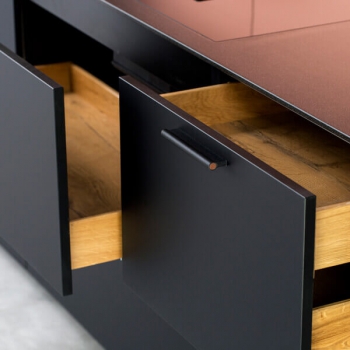 Black leather and copper drawer handles