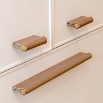 Cabinet handles made of leather and brass
