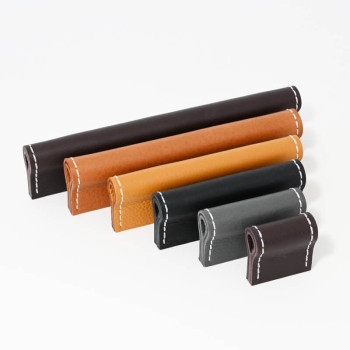 Unique cabinet leather pulls, handcrafted from orange brown leather