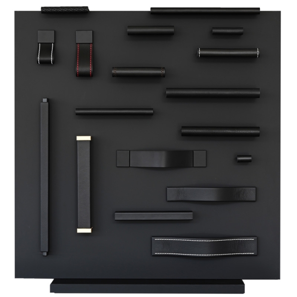 Black leather drawer pulls, handmade by minimaro at a display