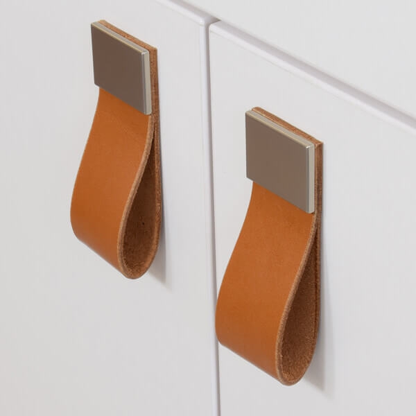 Drawer pulls made of brown leather