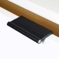 Preview: Black VERONA leather handle in size 82 with aluminum rod, surface-mounted on a white furniture front