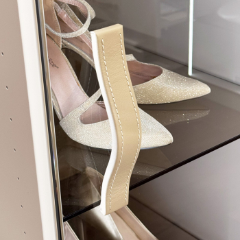 FIRENZE-PRESTIGE leather handle for cabinets in taupe on a glass door