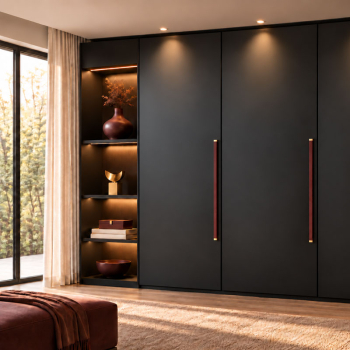 Long ROMA handles in mahogany leather with brass mounting bases, mounted vertically on dark wardrobe doors