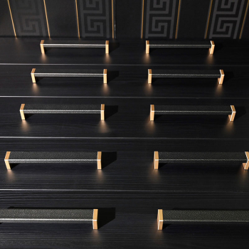 ROMA handles in Black Silver leather with brass mounting bases, arranged in two rows to show different sizes